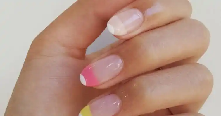 Cute French nail art with pastel nail colors. 