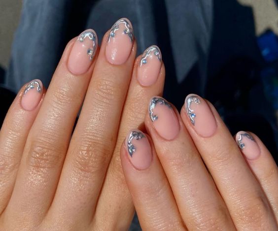 Boujee French tip nails with silver metallic accents