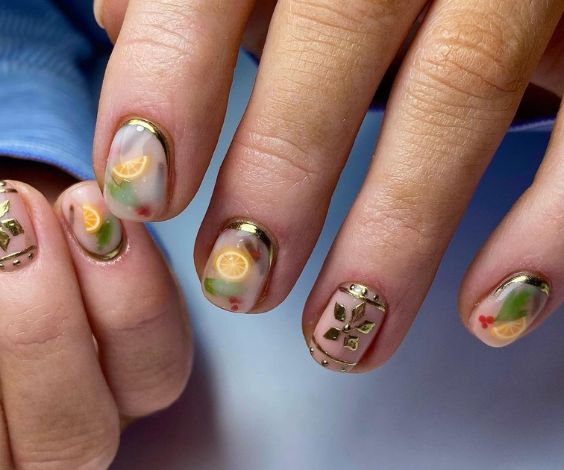 Cute November manicure with matte candle nail art. 