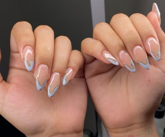 Light blue swirl tips for a winter French manicure