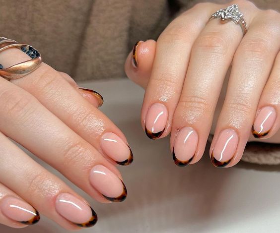 Brown November nails with tortoise French tips. 